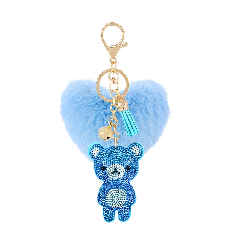 Schlüsselanhänger mit Pompon und strassbesetztem Teddybär